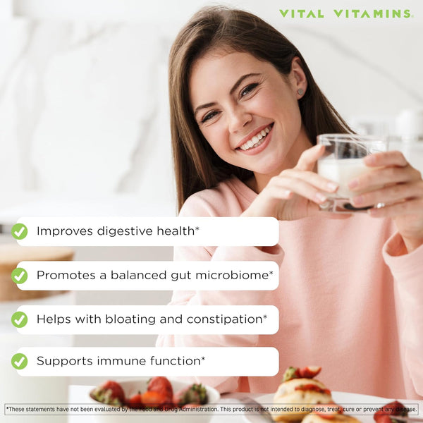 Smiling woman holding a glass - Vital Vitamins Probiotic Complex supports digestion, balanced gut microbiome and immune function