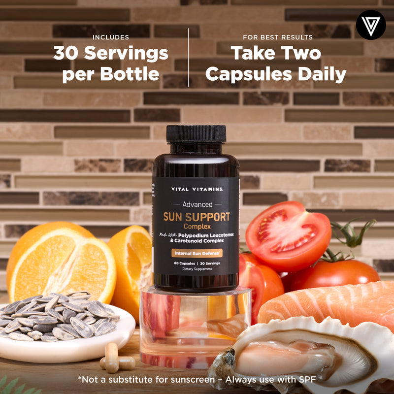 Vital Vitamins Sun Support Complex bottle with fruit on a tray - 30 servings, take two capsules daily with food